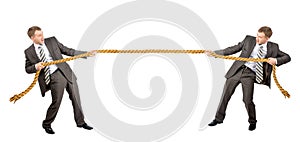 Tug war, two businessman pulling rope