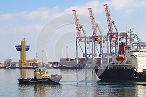 Tugboat assisting Cargo Ship maneuvered into the Port of Odessa, Ukraine.