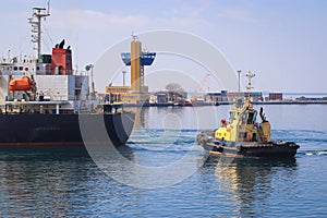 Tugboat assisting Cargo Ship maneuvered into the Port of Odessa, Ukraine.