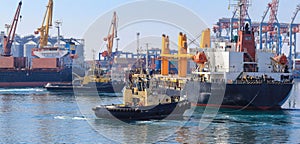 Tugboat assisting Cargo Ship maneuvered into the Port of Odessa, Ukraine.