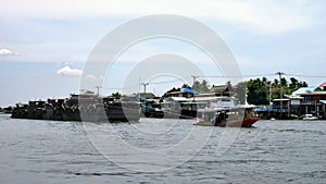 Tugboat and the barge in Chaopraya River