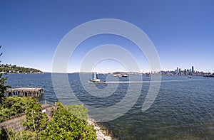 Tugboat in Elliott Bay with Seattle in view