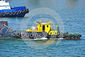 Tugboat in harbor quayside