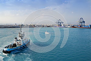 Tugboat nears Container Port, Cyprus photo