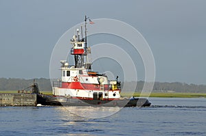 Tugboat Pushing A Barge