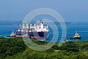 Tugboat towing a ship