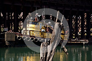 A tugboat waits on assignment at the Taconite Loading Docks