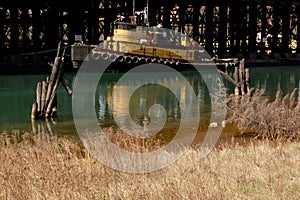 A tugboat waits duty at the Taconite Loading Docks