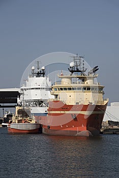 Tugboats alongside in port