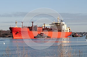 Tugboats Guiding Oil Tanker Ship