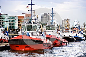 Tugboats in a row