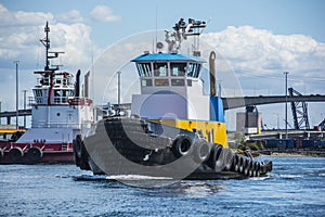 Tugs on Elliott Bay with West Seattle Bridge in the background