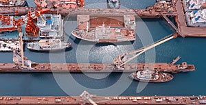 Tugs in the port near the pier