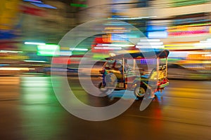 Tuk-tuk in motion blur, Bangkok, Thailand