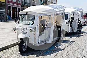 Tuk tuk moto taxi on Porto, Portugal. Electric transport for turists