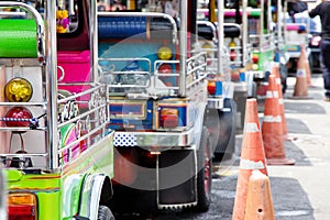 Tuk tuks taxi lined up in Bangkok