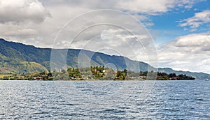 Tuktuk seen from Lake Toba