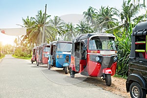 Tuktuk taxi on road of Sri Lanka Ceylon travel car photo