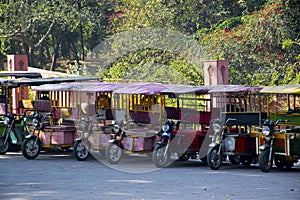 TukTuk vehicles standing at a tourist destination