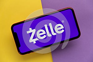 Tula, Russia - November 11, 2020: Zelle logo on iPhone display