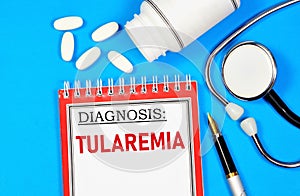 Tularemia. The inscription of the text of the diagnosis on the form in the medical folder.