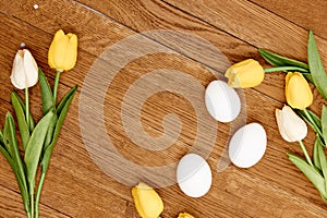 tulip easter eggs wooden background top Copy Space