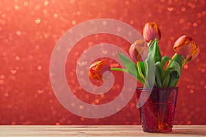 Tulip flowers bouquet over bokeh background