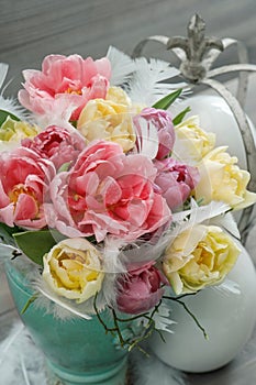 Tulip flowers with easter eggs decoration