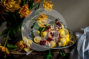 Tulips and fruit on a Wanli Kraak porcelain charger