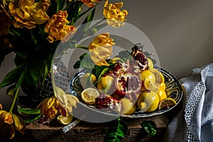 Tulips and fruit on a Wanli Kraak porcelain charger photo