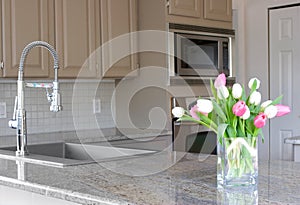 Tulips in a modern grey kitchen