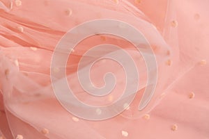 Tulle fabric texture background, textile pattern, pink polka dot on tulle, copy space