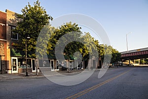 Tulsa USA Greenwood Avenue famous Black Wall Street destroyed during the Tulsa Massacre with trees lining street and