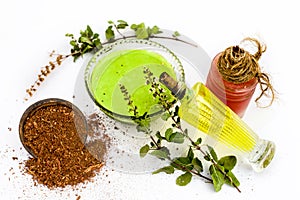 Tulsi face pack isolated on white consisting of sandal wood powder well mixed with tulsi leaves with the help of fuller` earth an