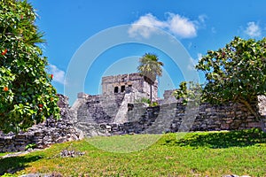 Tulum ancient Mayan port city on the Caribbean coast in Mexico YucatÃ¡n Peninsula. Views by El Castillo ruins. Central America. photo