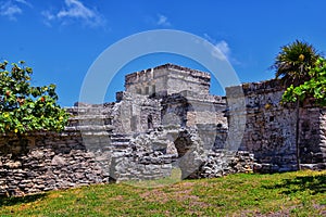 Tulum ancient Mayan port city on the Caribbean coast in Mexico YucatÃ¡n Peninsula. Views by El Castillo ruins. Central America. photo