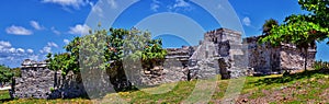 Tulum ancient Mayan port city on the Caribbean coast in Mexico YucatÃ¡n Peninsula. Views by El Castillo ruins. Central America. photo