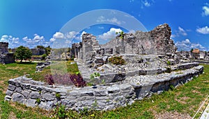 Tulum ancient Mayan port city on the Caribbean coast in Mexico YucatÃ¡n Peninsula. Views by El Castillo ruins. Central America. photo