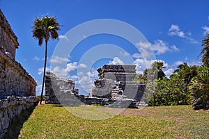 Tulum ancient Mayan port city on the Caribbean coast in Mexico YucatÃ¡n Peninsula. Views by El Castillo ruins. Central America. photo