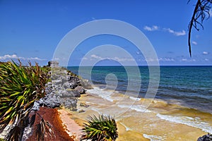 Tulum ancient Mayan port city on the Caribbean coast in Mexico YucatÃ¡n Peninsula. Views by El Castillo ruins. Central America. photo