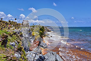 Tulum ancient Mayan port city on the Caribbean coast in Mexico YucatÃ¡n Peninsula. Views by El Castillo ruins. Central America. photo