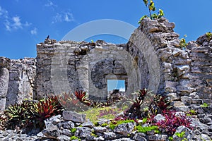 Tulum ancient Mayan port city on the Caribbean coast in Mexico YucatÃ¡n Peninsula. Views by El Castillo ruins. Central America. photo