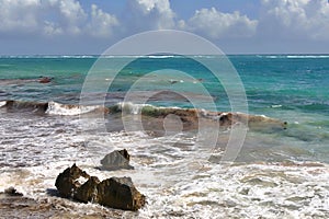 Tulum Mayan Ruins of Mexico over looking a rocky shore