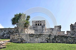 Tulum Mayan Ruins of Mexico over looking a rocky shore