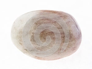 tumbled albite (moonstone) gemstone on white