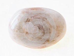 tumbled albite (moonstone) stone on white