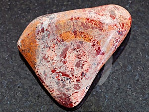 tumbled Brecciated Jasper stone on dark