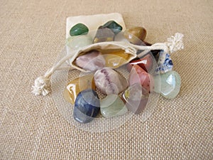 Tumbled gemstones in a small bag