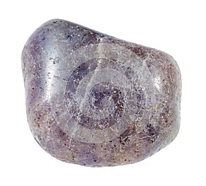 tumbled iolite gemstone isolated on white photo