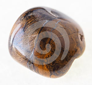 tumbled ox's eye (bull's eye, tiger's eye) stone